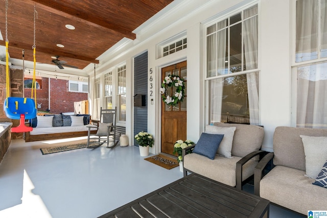 view of patio / terrace featuring covered porch and ceiling fan