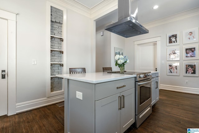 kitchen featuring light countertops, ornamental molding, a kitchen island, island range hood, and stainless steel range with electric stovetop