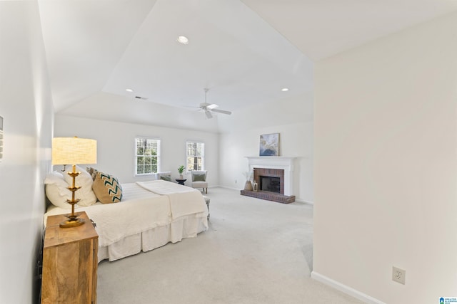 bedroom featuring recessed lighting, a brick fireplace, light colored carpet, and baseboards