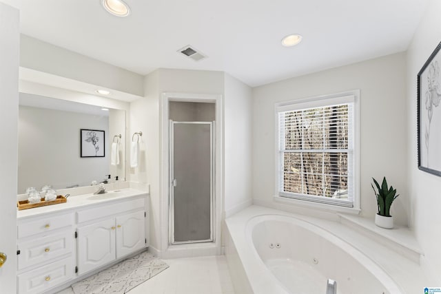 full bath featuring recessed lighting, vanity, visible vents, a shower stall, and a whirlpool tub