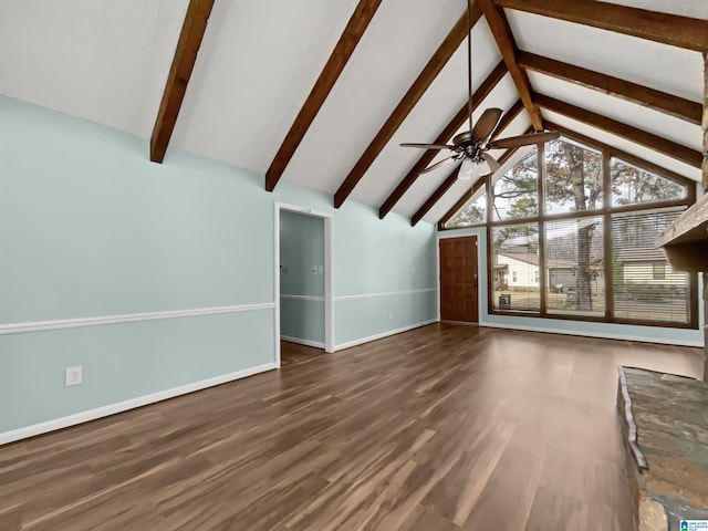 unfurnished living room featuring ceiling fan, high vaulted ceiling, wood finished floors, baseboards, and beam ceiling