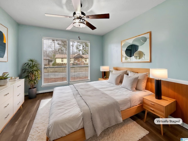 bedroom featuring ceiling fan and wood finished floors