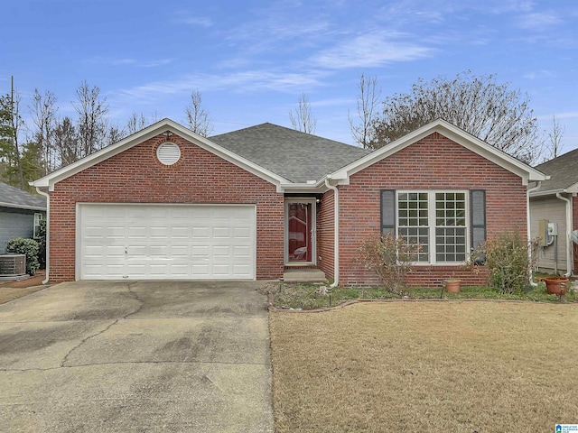 ranch-style home with roof with shingles, brick siding, concrete driveway, an attached garage, and a front lawn