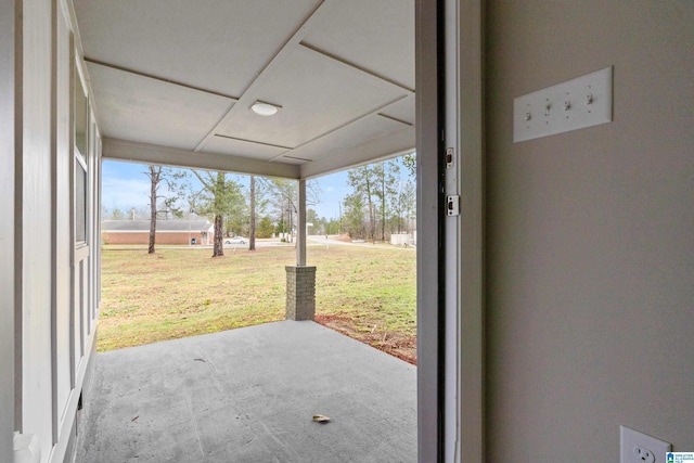 doorway to outside featuring plenty of natural light