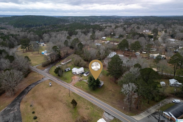 aerial view featuring a view of trees