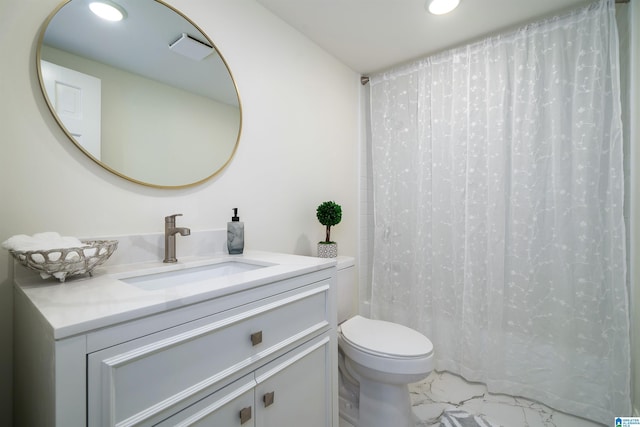 full bath featuring recessed lighting, marble finish floor, vanity, and toilet