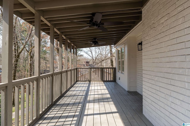 wooden terrace with ceiling fan