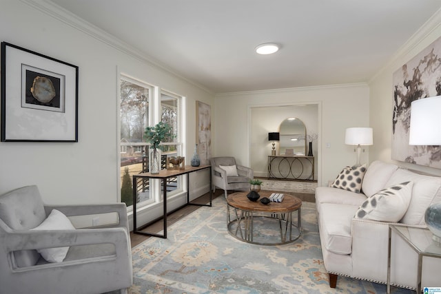 living area with ornamental molding and wood finished floors