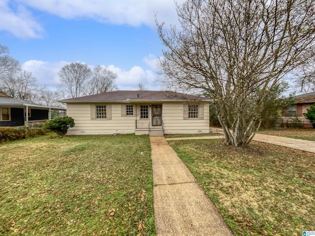 view of front of home with a front yard