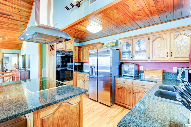 kitchen featuring glass insert cabinets, light wood-style floors, island range hood, wooden ceiling, and black appliances