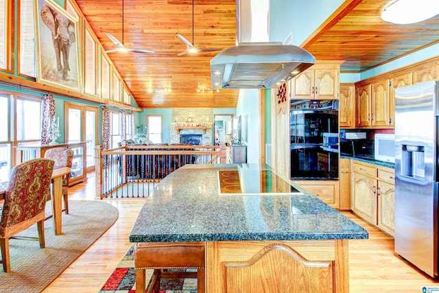 kitchen featuring island range hood, wood ceiling, light wood-type flooring, a center island, and black appliances