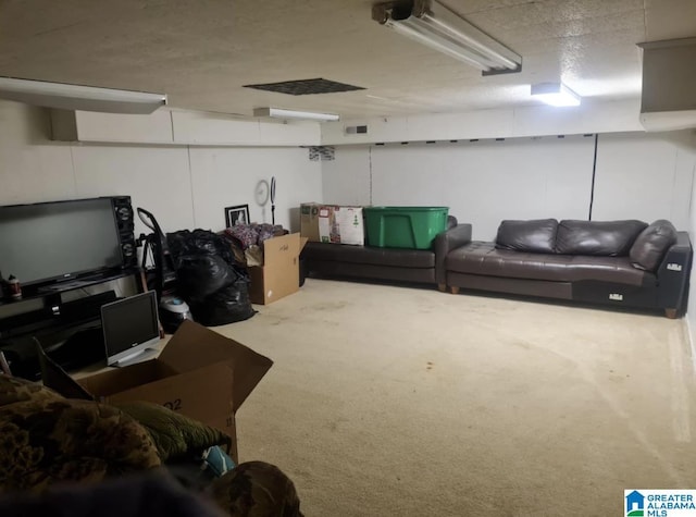 1525 NW Ridge St, Cullman, AL 35055 - finished basement featuring visible vents and carpet floors