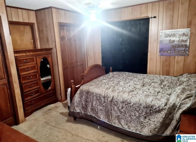 1525 NW Ridge St, Cullman, AL 35055 - bedroom with wooden walls and carpet flooring