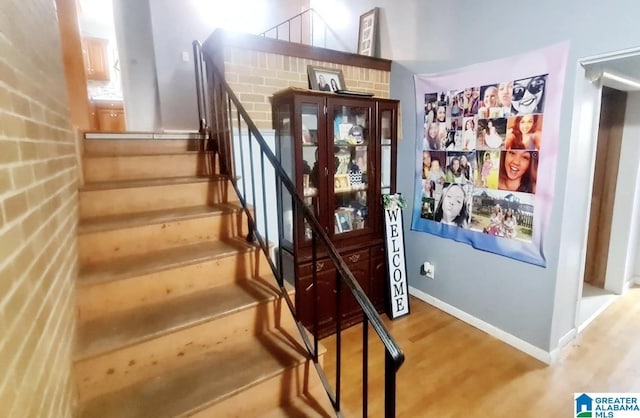 1525 NW Ridge St, Cullman, AL 35055 - entryway with stairway, baseboards, and wood finished floors