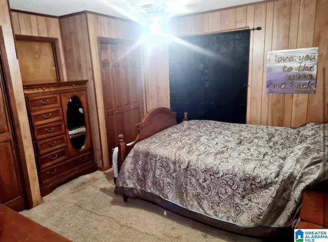 1525 NW Ridge St, Cullman, AL 35055 - bedroom featuring wooden walls and carpet flooring