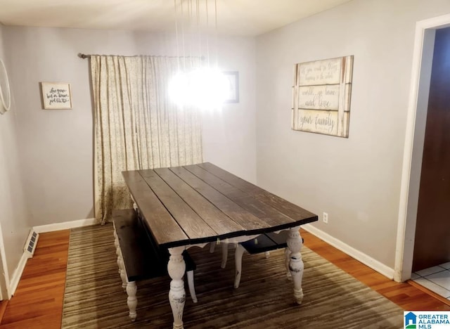 1525 NW Ridge St, Cullman, AL 35055 - dining space with baseboards and wood finished floors