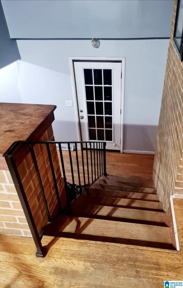 1525 NW Ridge St, Cullman, AL 35055 - stairs featuring wood-type flooring