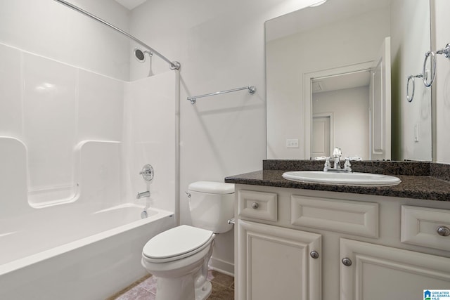 full bathroom with toilet, tile patterned floors, vanity, and shower / bathing tub combination