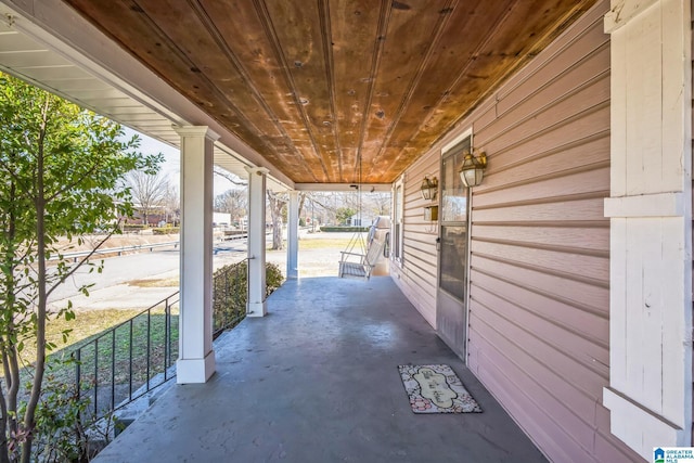 view of patio featuring a porch