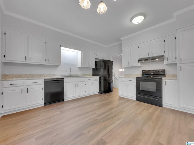 kitchen with white cabinets, under cabinet range hood, light countertops, black appliances, and a sink