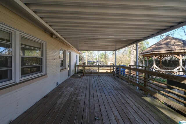 wooden terrace with a gazebo