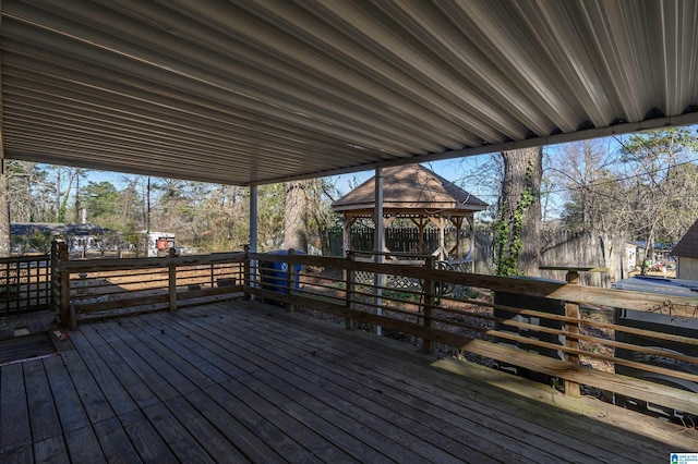 wooden terrace with a gazebo