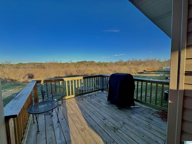 wooden deck with area for grilling