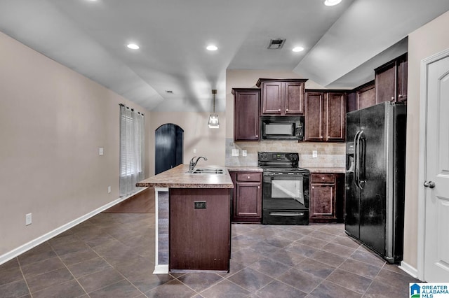 kitchen with visible vents, arched walkways, vaulted ceiling, black appliances, and a sink