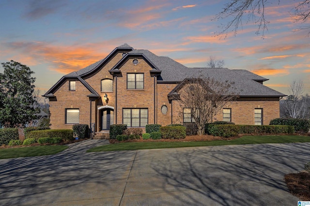 view of front of property featuring brick siding