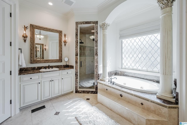 full bath with vanity, ornate columns, a tub with jets, a stall shower, and crown molding