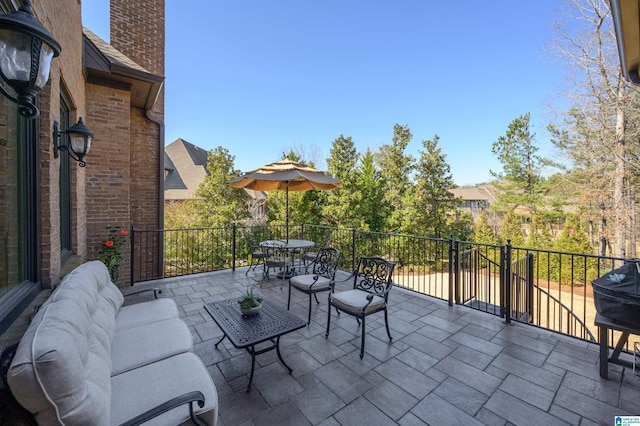 view of patio featuring an outdoor hangout area and outdoor dining area