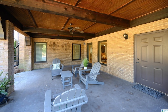 view of patio featuring a ceiling fan