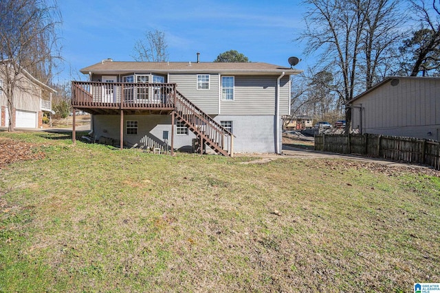 rear view of property with a yard, stairs, fence, and a wooden deck