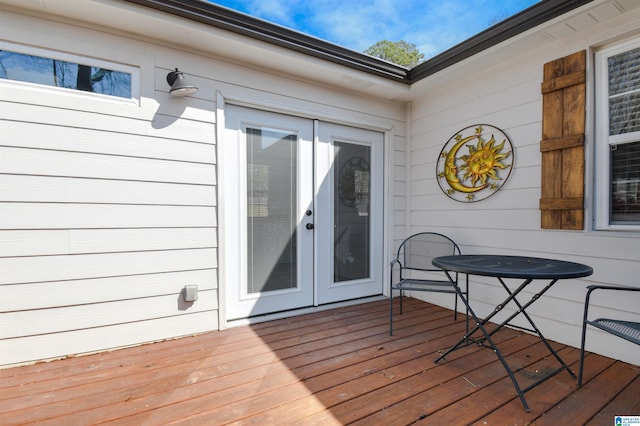 wooden deck featuring french doors