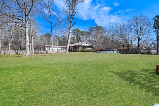 view of yard with fence