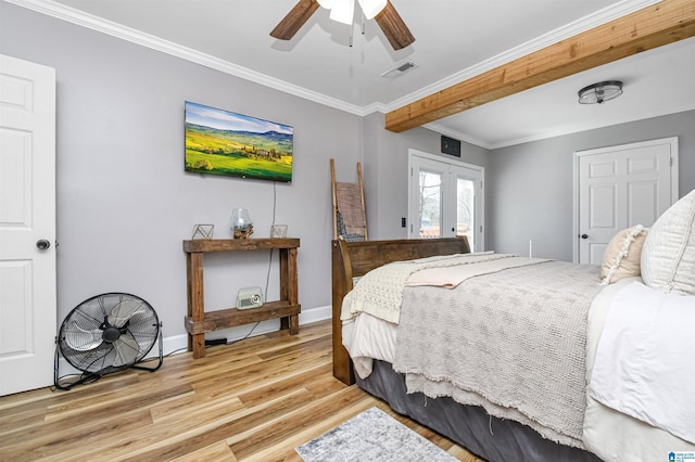 bedroom featuring french doors, visible vents, ornamental molding, light wood-type flooring, and baseboards