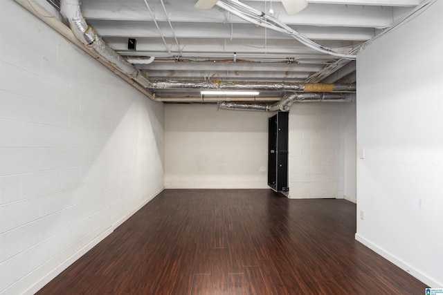 unfinished basement featuring wood finished floors