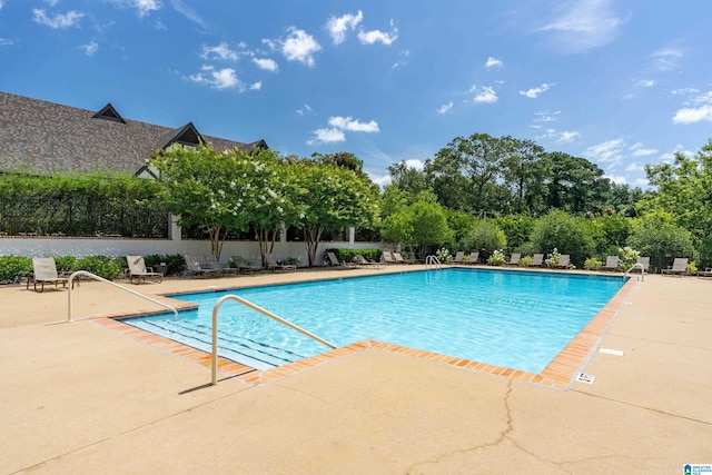 pool featuring a patio