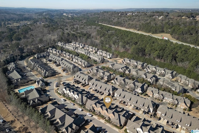 drone / aerial view with a view of trees