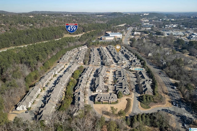 bird's eye view with a forest view