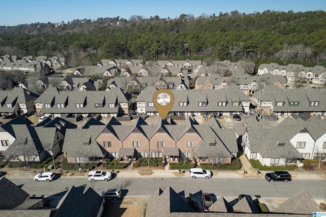 birds eye view of property with a residential view