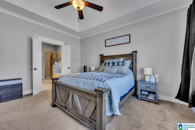 bedroom featuring baseboards, a raised ceiling, and carpet flooring