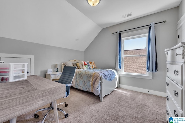 bedroom featuring vaulted ceiling, light carpet, visible vents, and baseboards