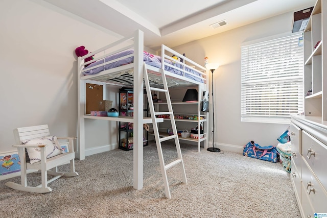 bedroom with carpet flooring, baseboards, and visible vents