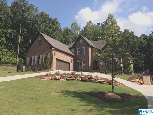 view of front facade featuring an attached garage, brick siding, concrete driveway, and a front yard