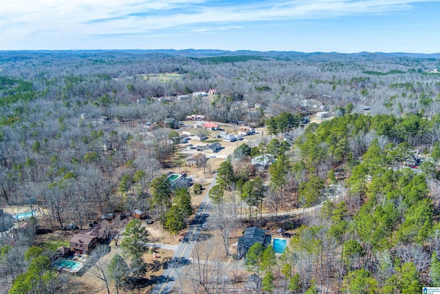 aerial view with a wooded view