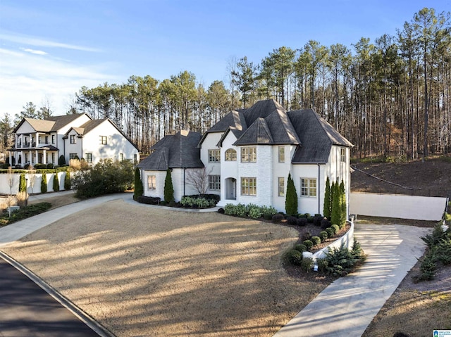 french country inspired facade with a residential view