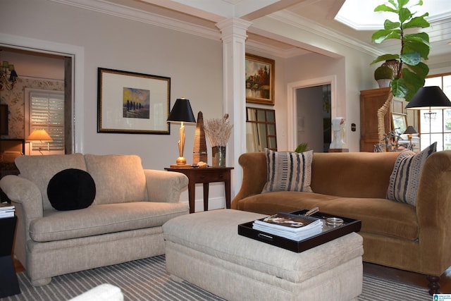 living room featuring ornamental molding and decorative columns