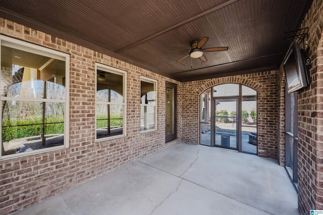 view of patio featuring a ceiling fan