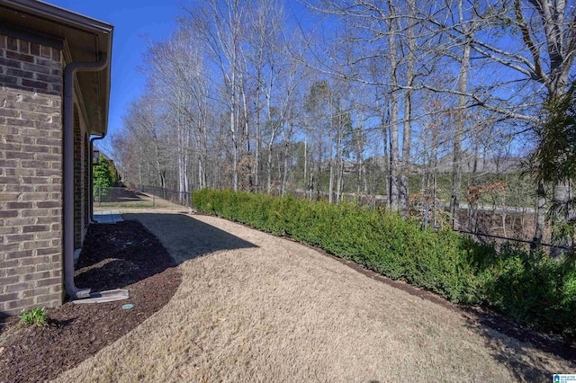 view of yard featuring fence